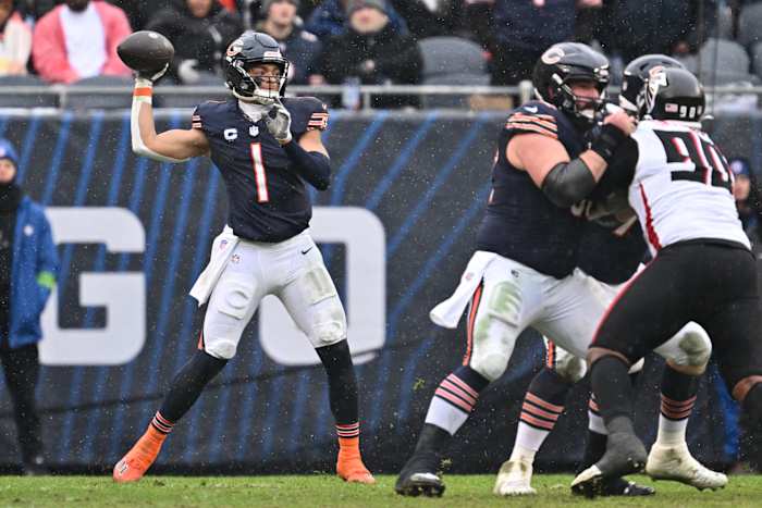 Dec 31, 2023; Chicago, Illinois, USA; Chicago Bears quarterback Justin Fields (1) passes in the first half against the Atlanta Falcons at Soldier Field.